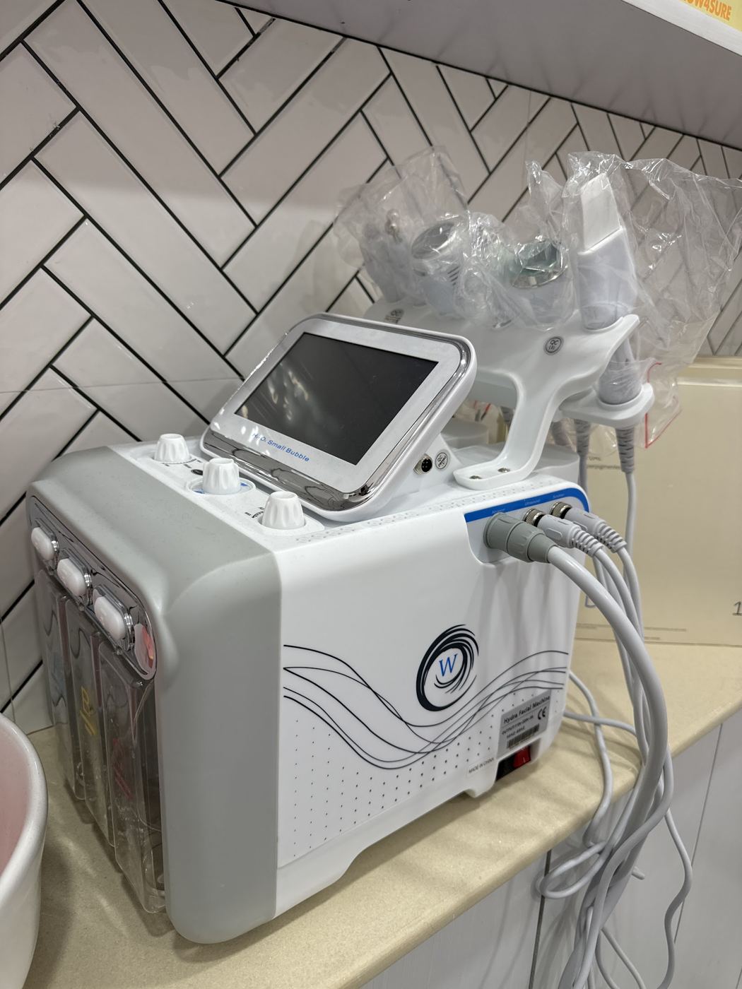 Hydrafacial machine set up in the treatment room.